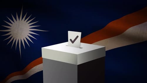 Casting vote into the ballot box during Marshall Islands election