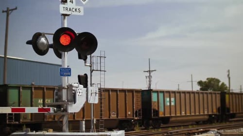 Flashing red lights while train crosses with sound
