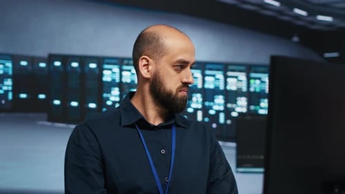 Computer Scientist Repairing Blade Server Storage Racks