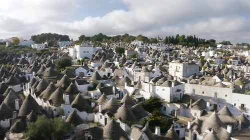 Establishing Shot of Alberobello Homes in Famous Italian Town