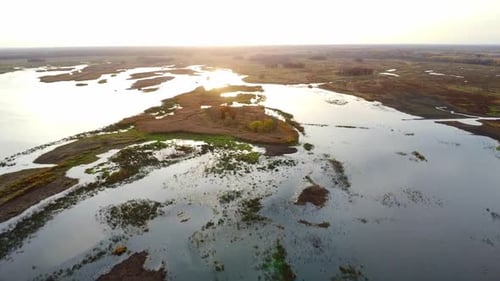Incredible sunset reflected in the waters of the wetlands in the fall, Sherburn National Wildlife Re