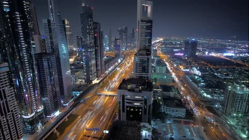 Glowing Cityscape As Night Falls
