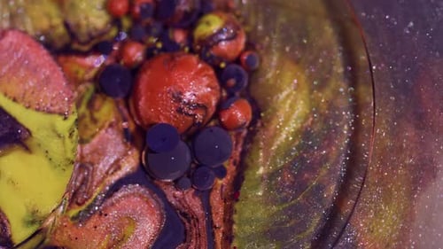 Colorful Ink Bubbles Floating and Swirling