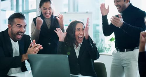 Applause, laptop and business people in office with celebration for finance investment revenue