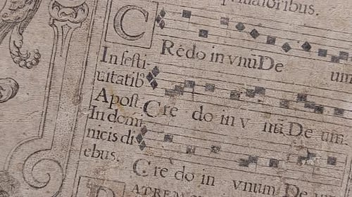 Antique Book of Historical Music Page Close Up