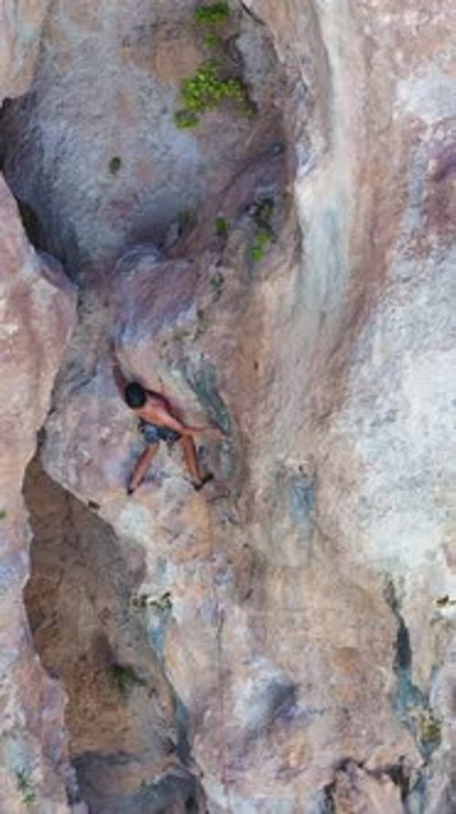 Man Climber Rock Climbing Antalya Turkey Aerial View Vertical Video