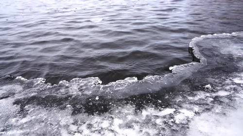 Cold water lake with iced edge