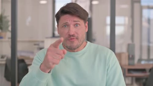 Adult Man Talking to the Camera Close Up