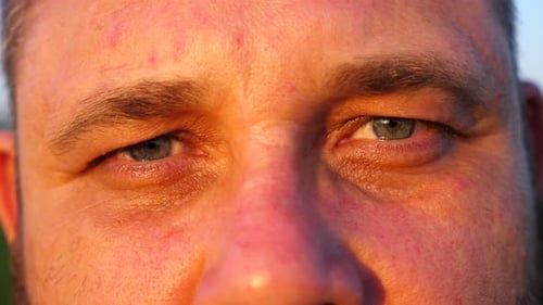 Close Up of Man's Eyes in Warm Light