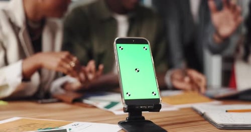 Business people, meeting and phone with green screen for app development, design or planning