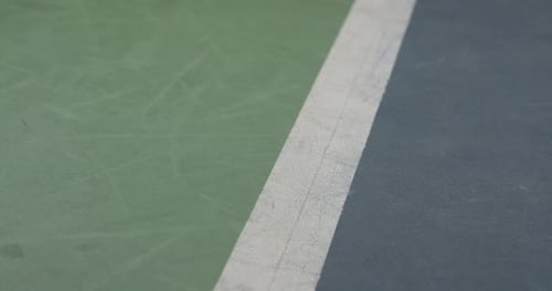 Tennis Tournament in Indoor Court Tennis Ball Hits on the Surface of Court Slow Motion