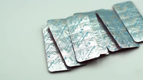 Medicine Blister Packs on a White Surface