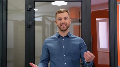 Friendly Seller in Window Shop with Keys