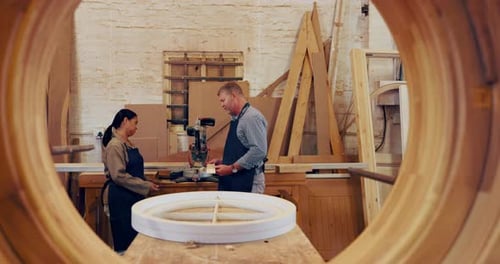 Workshop, carpenter and mentor with woman, wood and manager in startup, working and tools