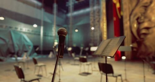 Musicians Prepare for a Performance in an Empty Concert Hall