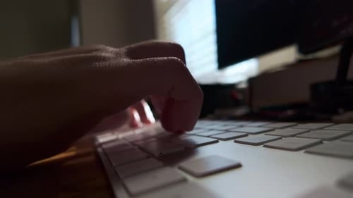 Person Typing of Code on the Computer Keyboard Close Up Move Camera View Footage