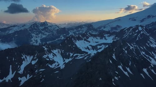 Aerial View Beautiful Enticing Snowy Mountains Amid Cloudy Sky Beauty of Enticing Snowy Mountains