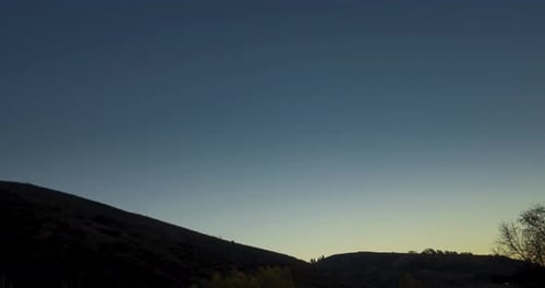 Mountain Meadow Timelapse at the Summer or Autumn Sunrise Time Wild Nature and Rural Field Clear Sky