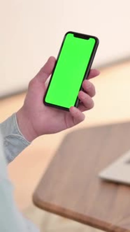 Phone with Green Screen Held and Touched