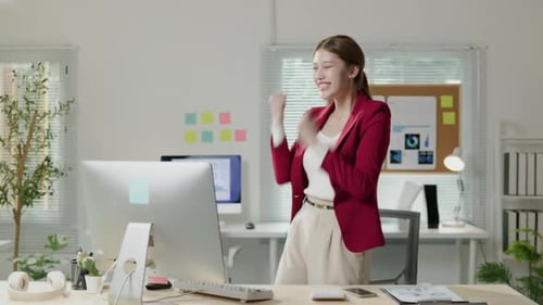 African Businesswoman in suit is working on laptop office space