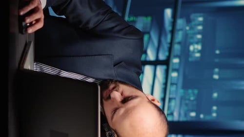 Stressed Businessman Working Late at Night