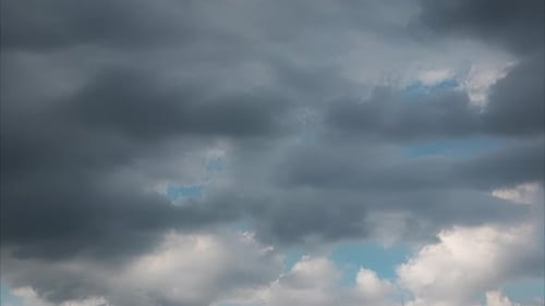 Time Lapse of Clouds Passing Over Blue Sky