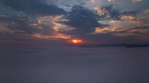 Aerial Timelapse Experience a Spectacular Sunset Above the Clouds in