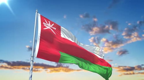 Realistic 3D Oman Flag Waving in the Wind Against a Blue Sky