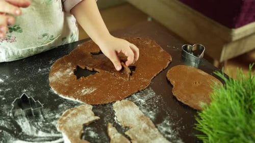 Child Baking Festive Cookies for Christmas Holiday