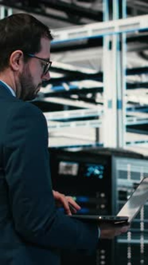 Vertical Video Writing Code Laptop Program and Software Developer in Data Center