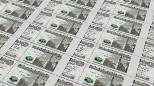 100 EGYPTIAN POUND banknotes printed by a money press