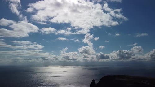 Aerial View on Calm Azure Sea and Volcanic Rocky Shores Small Waves on Water Surface Nature Summer
