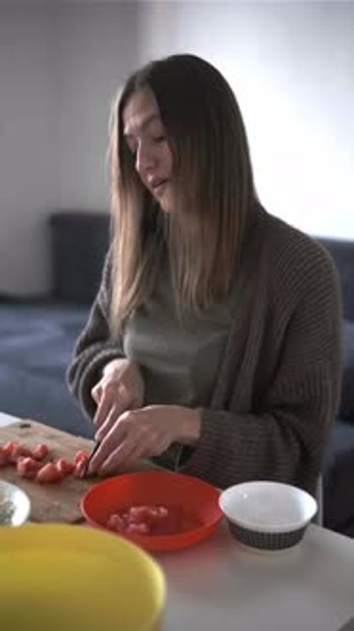 Closeup of Woman Slicing Tomatoes Preparing Fresh Vegetables