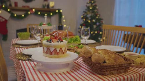 Shot of Christmas turkey and many of foods on table in decorating room.
