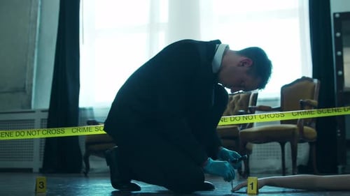 Investigator Examining Crime Scene with Body and Markers