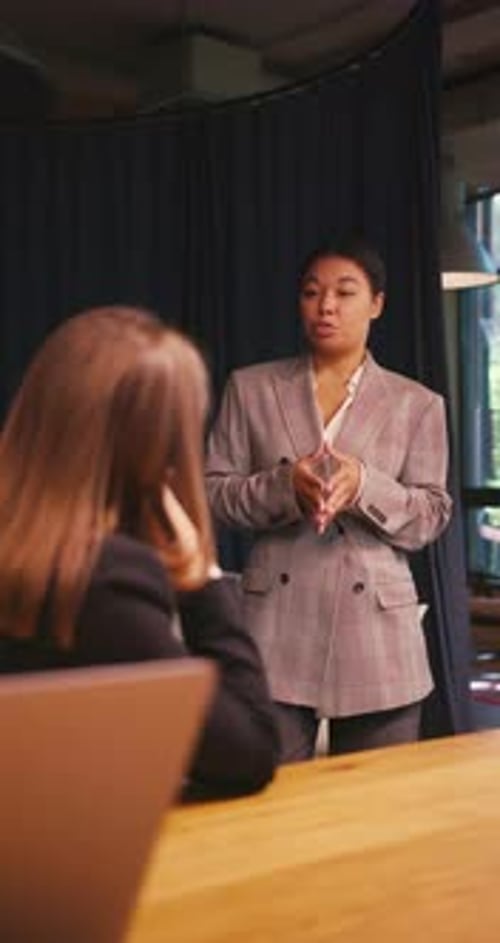 Woman Office Worker Shows Colorful Infographic to Manager