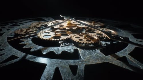 Clock Gear Mechanism Close Up in Dark