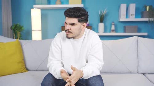 Young man angry with himself.