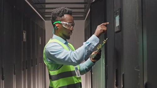 System Administrator Operating Mainframe in Server Room