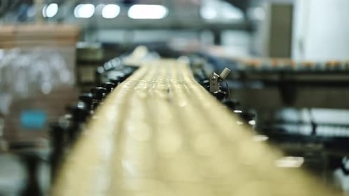 Golden cans in a beverage factory