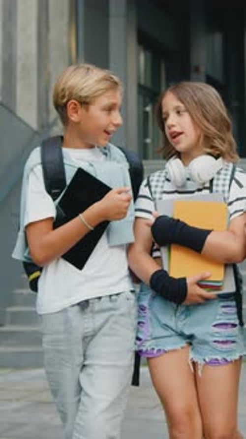 Children Walking and Talking Outside School Building