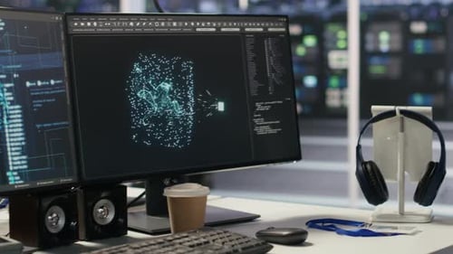 Close Up of Monitors in Data Center Office Overseeing Hardware