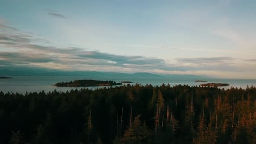 A panning drone shot looking east from Vancouver island of British Columbia Canada's Salish sea. Sho