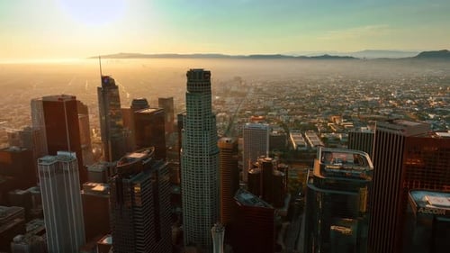 Scenery of Los Angeles, California, the USA at sunset. Drone footage among the downtown skyscrapers