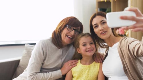 Three Generations of Women Taking a Selfie