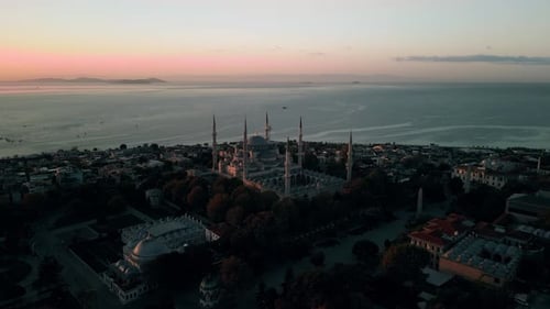 Aerial drone footage at blue hour of Sultan Ahmed Mosque in Istanbul, Turkey.