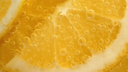 Close Up Of Bubbly Lemon Slice