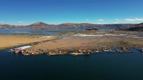Aerial View of Lake Titicaca, Peru with Floating Villages, Boats, Islands, Mountainous Landscape 2