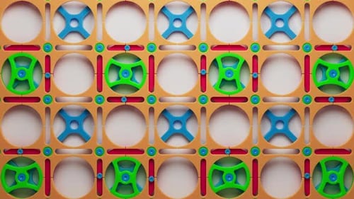 Looping animation of a group of colorful children plastic geometric shapes.