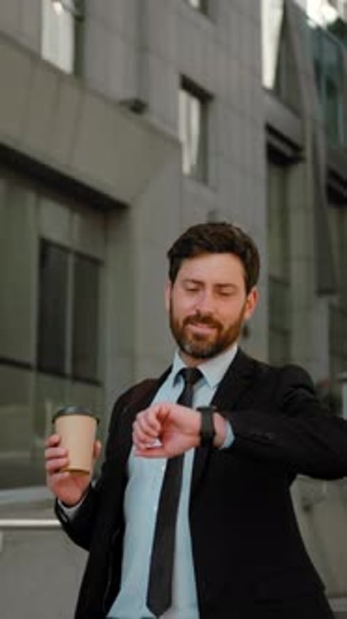 Professional Man Walking and Checking Time in City